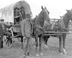 Charles Jacob Poole Family in covered wagon, date unknown | Contributed by Mary Ann Aaron Charles Jacob Poole Family in covered wagon, date unknown