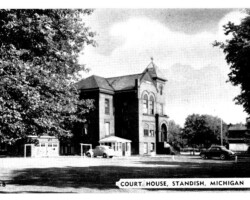 Old red brick counry courthouse. 3rd county courthouse but 1st one in Standish built 1892 of "Richardsonian Romanesque" design. Demolish c 1965 to build the 4th courthouse (2nd in Standish), Gerganoff of Ypsilanti, architect; date unknown | Contributed by Robert Kosick